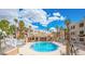 Inviting community pool area with well-maintained landscaping and comfortable seating, ideal for relaxation at 2044 Mesquite Ln # 202, Laughlin, NV 89029