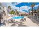 Community pool offers a refreshing escape with plenty of seating and stunning views of the surrounding complex at 2044 Mesquite Ln # 202, Laughlin, NV 89029