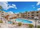Community pool with ample seating and shade provides a refreshing retreat amidst well-maintained grounds at 2044 Mesquite Ln # 202, Laughlin, NV 89029