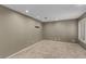 Neutral bedroom with carpet floors, recessed lighting, and window shutters at 227 Drysdale Cir, Henderson, NV 89074