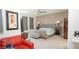 Modern bedroom features textured accent wall, plush bed, and neutral color scheme at 230 Carmel Sky St, Las Vegas, NV 89138