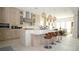 Spacious kitchen with stainless steel appliances, a large island, and pendant lighting at 230 Carmel Sky St, Las Vegas, NV 89138