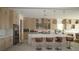 Contemporary kitchen boasting a center island, stainless steel appliances, and custom cabinetry at 230 Carmel Sky St, Las Vegas, NV 89138