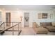 Cozy upstairs living space showcases a comfortable tan sectional and bright, neutral decor at 230 Carmel Sky St, Las Vegas, NV 89138