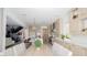 Expansive living space showcasing an open floor plan with a kitchen and living room at 230 Carmel Sky St, Las Vegas, NV 89138