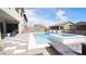 Inviting pool and spa area with comfortable lounge chairs perfect for relaxation and enjoying the sun at 230 Carmel Sky St, Las Vegas, NV 89138