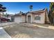 Charming single-story home featuring desert landscaping, solar panels, and a two-car garage at 2504 Soldier Creek Ct, Las Vegas, NV 89106
