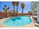 Serene backyard with a clear swimming pool, perfect for relaxation and enjoying sunny days at 266 Cordero Dr, Henderson, NV 89074