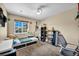 Bright bedroom with a window, playful decor, and functional furniture at 266 Cordero Dr, Henderson, NV 89074