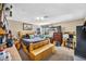 Bedroom with a wooden bed, carpeted floors, a window, and dark colored bedding at 266 Cordero Dr, Henderson, NV 89074