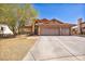 Charming home featuring a terracotta roof, a two-car garage, and desert-friendly landscaping at 266 Cordero Dr, Henderson, NV 89074