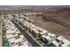 Planned community of modern desert homes that line the streetscape against mountain views at 292 Crimson Edge St, Henderson, NV 89012