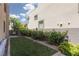 Landscaped backyard featuring a small lawn and privacy landscaping at 292 Crimson Edge St, Henderson, NV 89012