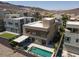 Stunning aerial view of a modern home featuring a private pool and covered patio at 292 Crimson Edge St, Henderson, NV 89012