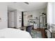 Bright bedroom with hardwood floors, comfortable bed, and stylish decor creates a relaxing and inviting space at 292 Crimson Edge St, Henderson, NV 89012