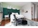 Cozy bedroom features a comfortable bed, hardwood floors, and tasteful decor for a relaxing atmosphere at 292 Crimson Edge St, Henderson, NV 89012