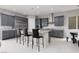 Contemporary kitchen with gray cabinets, stainless steel appliances, and granite countertops at 292 Crimson Edge St, Henderson, NV 89012