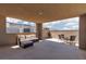 Outdoor patio lounge area with comfortable seating and expansive city views at 292 Crimson Edge St, Henderson, NV 89012
