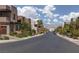 Upscale neighborhood street featuring modern homes and city views at 292 Crimson Edge St, Henderson, NV 89012