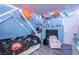 Playful bedroom adorned with planet-themed decorations and a unique bed frame at 3018 Sunrise Bay Ave, North Las Vegas, NV 89031