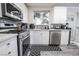 Bright and modern kitchen equipped with stainless steel appliances, ample counter space, and subway tile backsplash at 3018 Sunrise Bay Ave, North Las Vegas, NV 89031