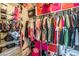 Organized walk-in closet with ample storage, shelving, hanging rods, and mirrored accents at 3018 Sunrise Bay Ave, North Las Vegas, NV 89031