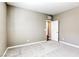 A cozy bedroom featuring neutral-toned walls and plush carpeting at 3122 Berceto Ct, Henderson, NV 89044