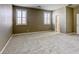 Comfortable bedroom featuring neutral carpet and natural light from windows at 3122 Berceto Ct, Henderson, NV 89044