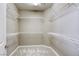 Walk-in closet with carpet flooring and wire shelving units at 3122 Berceto Ct, Henderson, NV 89044