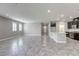 A modern living space flows to an open kitchen with recessed lighting at 3122 Berceto Ct, Henderson, NV 89044