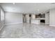 A spacious living area showcases tile floors with an open layout to the kitchen at 3122 Berceto Ct, Henderson, NV 89044
