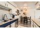 Modern kitchen with stainless steel appliances, granite countertops, and stylish backsplash, perfect for cooking and entertaining at 3135 S Mojave Rd # 146, Las Vegas, NV 89121