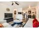 Open-concept living space with stylish decor, modern furniture, and a seamless flow into the dining area at 3135 S Mojave Rd # 146, Las Vegas, NV 89121
