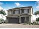 Charming two-story home with a two-car garage and well-maintained landscaping at 3228 Walker River St, North Las Vegas, NV 89032