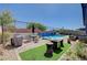 Beautiful backyard area featuring a luxurious pool and patio area at 33 Reverie Heights Ave, Henderson, NV 89011