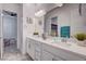 Bright bathroom featuring a double vanity sink with ample storage and lots of counter space at 33 Reverie Heights Ave, Henderson, NV 89011