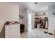 Large closet with custom shelving, rod system, and bonus storage in the attached room at 33 Reverie Heights Ave, Henderson, NV 89011