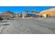 A community entrance featuring desert landscaping, stone accents and palm trees at 33 Reverie Heights Ave, Henderson, NV 89011
