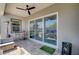 Covered patio with ceiling fan and access to the pool area at 33 Reverie Heights Ave, Henderson, NV 89011