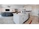 Bright kitchen with white cabinetry, stainless steel appliances, and open layout at 33 Reverie Heights Ave, Henderson, NV 89011