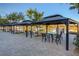 Picturesque outdoor patio area featuring covered seating with lakefront views at 33 Reverie Heights Ave, Henderson, NV 89011