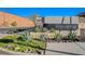 Community entrance sign beautifully landscaped with decorative rock and desert plants at 'Reverie' at 33 Reverie Heights Ave, Henderson, NV 89011