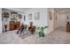 Bright sitting area with stylish decor, unique furnishings, and convenient access to the entryway at 33 Reverie Heights Ave, Henderson, NV 89011