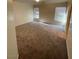 Bedroom with neutral colored walls and carpet featuring two windows at 3425 Palatine Hills Ave, North Las Vegas, NV 89081