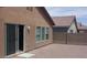 Exterior of home featuring three windows and a door at 3425 Palatine Hills Ave, North Las Vegas, NV 89081
