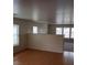 Living room features hardwood floors and lots of natural light from windows at 3425 Palatine Hills Ave, North Las Vegas, NV 89081
