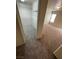 Spacious walk-in closet with shelving and carpet at 3425 Palatine Hills Ave, North Las Vegas, NV 89081