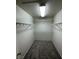Spacious walk-in closet with shelving and carpet at 3425 Palatine Hills Ave, North Las Vegas, NV 89081