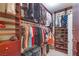 Spacious walk-in closet featuring custom shelving and ample hanging space for clothes and accessories at 3540 Wisdom Ct, Las Vegas, NV 89120