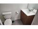 Bathroom features a toilet and vanity with a sink, offering essential amenities in a compact space at 3717 Casey Dr, Las Vegas, NV 89120